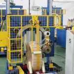 "compact coil wrapping machine: efficient packaging solution"