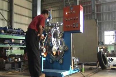 “Compact Tyre Wrapper with Coil Stretch Technology”