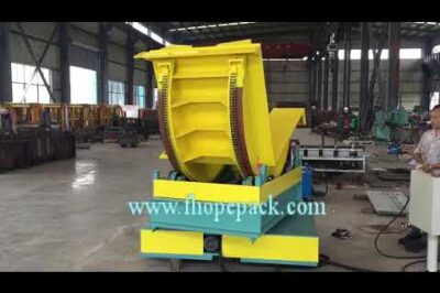Compact coil turner with rotating platform.