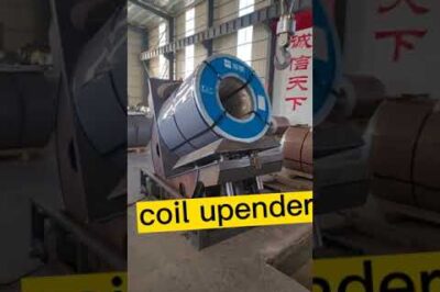 Compact coil upender for efficient and space-saving coil handling.