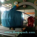 compact horizontal packing machine for wire coil and pipe packaging.