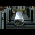"compact horizontal stretch wrapper for pipe packaging"