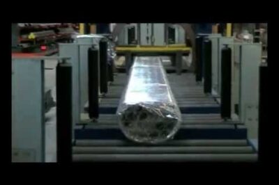 “Compact horizontal stretch wrapper for pipe packaging”