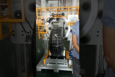 Compact hose coiling machine for efficient wrapping.