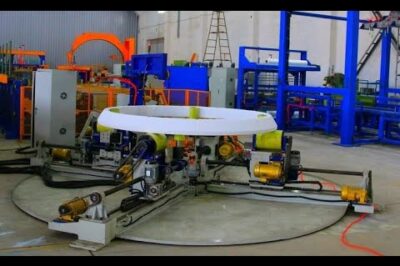 Compact machine automates packaging of large bearings.