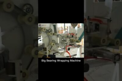 Compact machine for packing bearings efficiently.