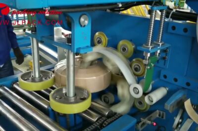 Compact machine for packing horizontal bearings.