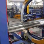 "compact machine wraps and secures bundles with consistent spacing."