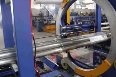 “Compact machine wraps and secures bundles with consistent spacing.”