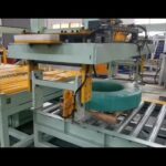 compact packaging line for steel coil strips.