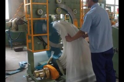Compact steel coil wrapping machine for various coil types.