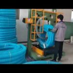 compact vertical hose coiling machine.