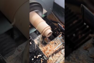 Crafting wood with a machine for carving.