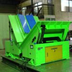 "efficient coil tilter for improved handling"