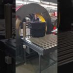 "efficient tire packaging with orbital wrapping machine for easy transportation."