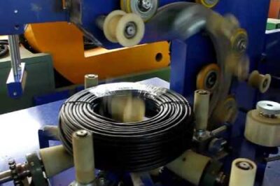 Film-based cable packing and wrapping machine in under 12 words.