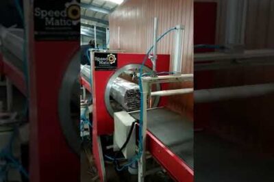 Fully automated machine for stretching and wrapping orbital rings.