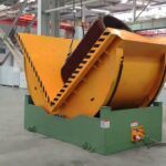 heavy duty coil and roll shape product upender with high capacity.