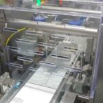 high speed automatic flow wrapping machine for diagnostic kit packaging.