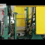 horizontal stretch wrapping machine with film covering for large objects.