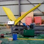 hydraulic device rotating objects by 90 degrees.