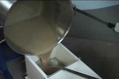 Large soap batches poured easily with pot tipper from SoapEquipment.