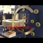 machine for packing coiled hose pipes horizontally in less than