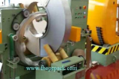Machine for wrapping coils and stretch wrapping.