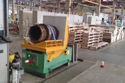 Motor roll turning device for upending and tilting purposes.