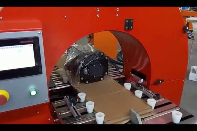 Motorized tray stretch wrapper with orbital horizontal stretching.