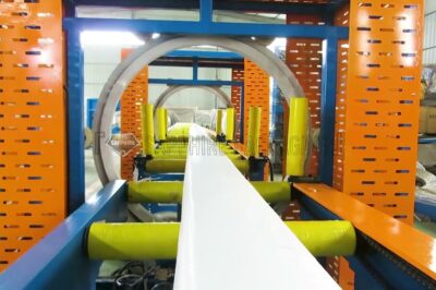 Orbital wrapper and stretch film machine for horizontal wrapping.