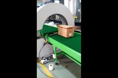 Orbital wrapper for horizontal packaging of boxes.