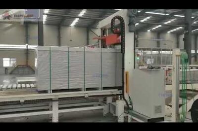 Panel and board strapping machine with automatic functionality.