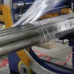 pipe and profile wrapping machine for steel, copper, and aluminum