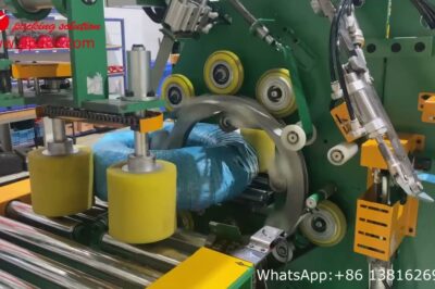 Pipe coil wrapping machine for horizontal applications.