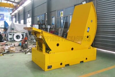 Steel coil upender machine for factory turnover and coil tilting.