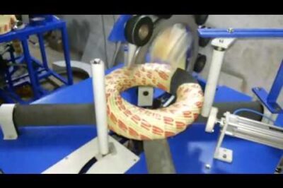 Stretch Wrapping Machine for M.S Binding Wire Coils at High Speed