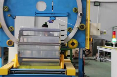 Testing video of large wire coil wrapping machine.