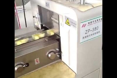 Tray-based sandwich packaging machine with horizontal wrapping for HFFS.