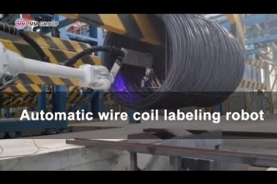Wire coil labeling robot for robotic coil packaging system.
