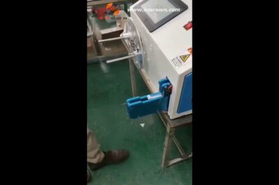 Wire coiling and bundling machine with cable tie tying capabilities.