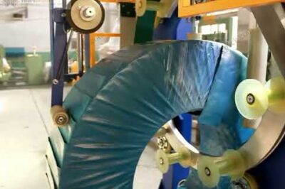 Wire coiling machine with tapping feature.