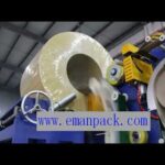 wire roll packing machinery with stretch wrapper for steel coils.