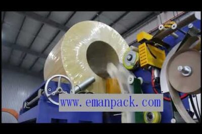 Wire roll packing machinery with stretch wrapper for steel coils.