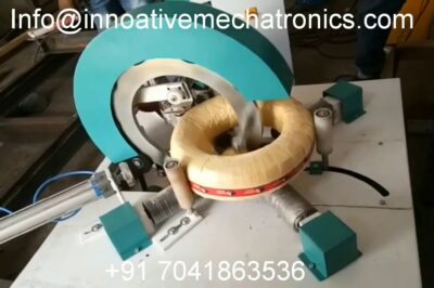 Wire wrapping machine for steel coils.